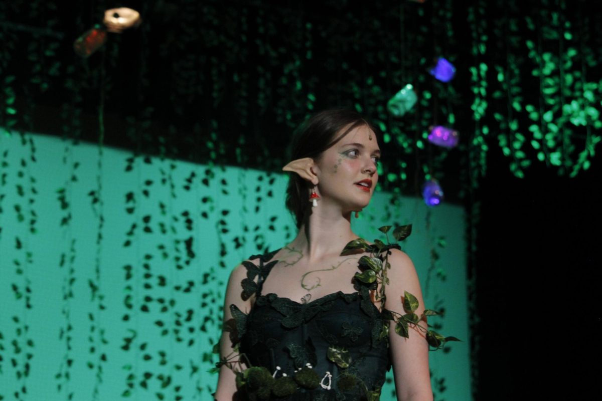 Senior Jules Joens, who played Titania, looks back at Oberon during a performance of a Midsummer Nights Dream.