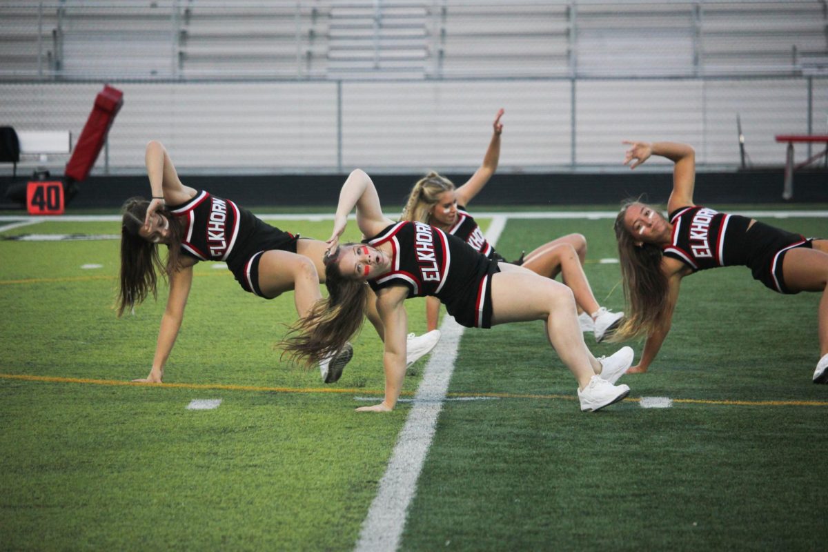 Senior Sophia Anderson dances at the red white scrimmage. The dance team made their half-time performance debut on August 22nd.  