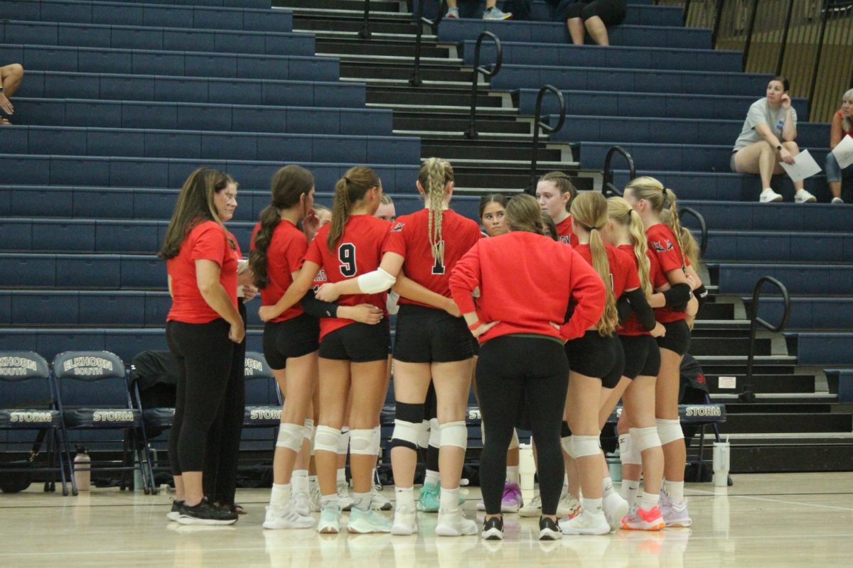 The Antler Volleyball team takes a timeout to talk about their next play. The Antlers lost to the Storm in the Volleyball Jamboree.