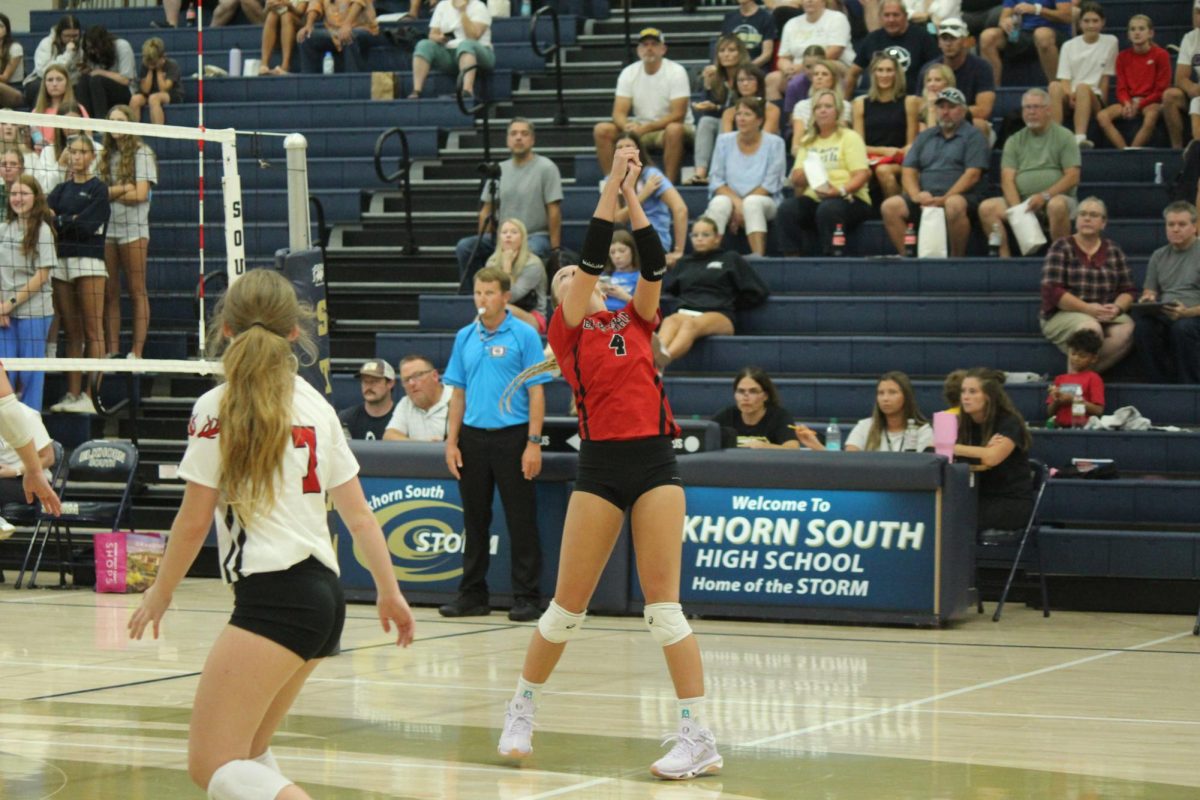 Senior Ava McCaslin passes the ball over the net. The Antlers lost to the Storm in the Volleyball Jamboree.