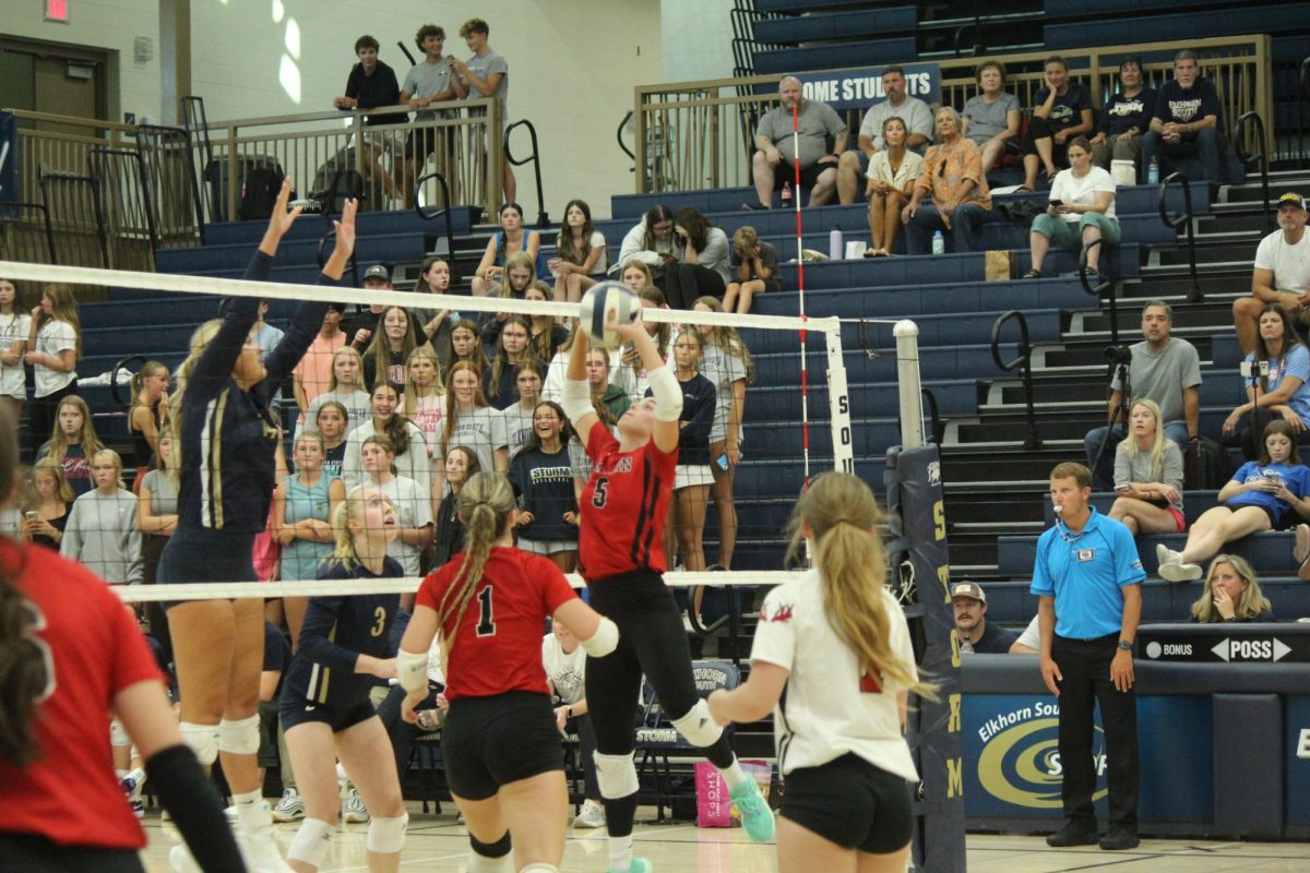 Senior Lauren Fast sets the ball for senior Addie Hunt. The Antlers lost to the Storm in the Volleyball Jamboree.