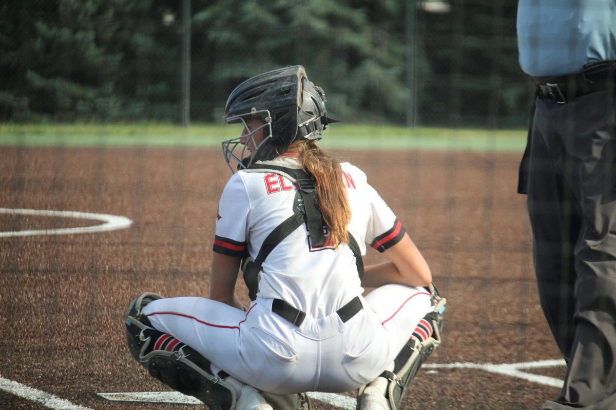 Catcher Kinsley Coleman reads the sign her coaches gave. This took place at the JV game versus Waverly.