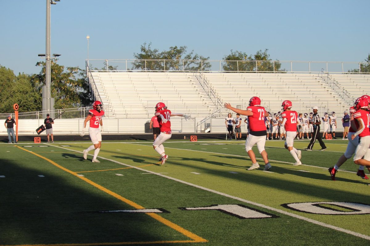 Reid Stec and Jack Metschke celebrating after a long run for a touchdown.