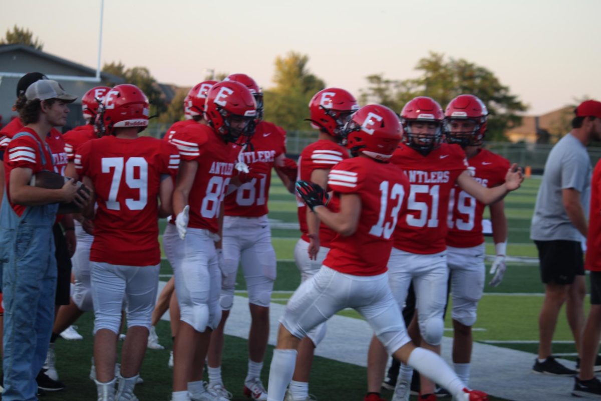 After the touchdown pass caught by Matthew Ott, him and Brady Mataele celebrate. This gained confidence for the whole team. 