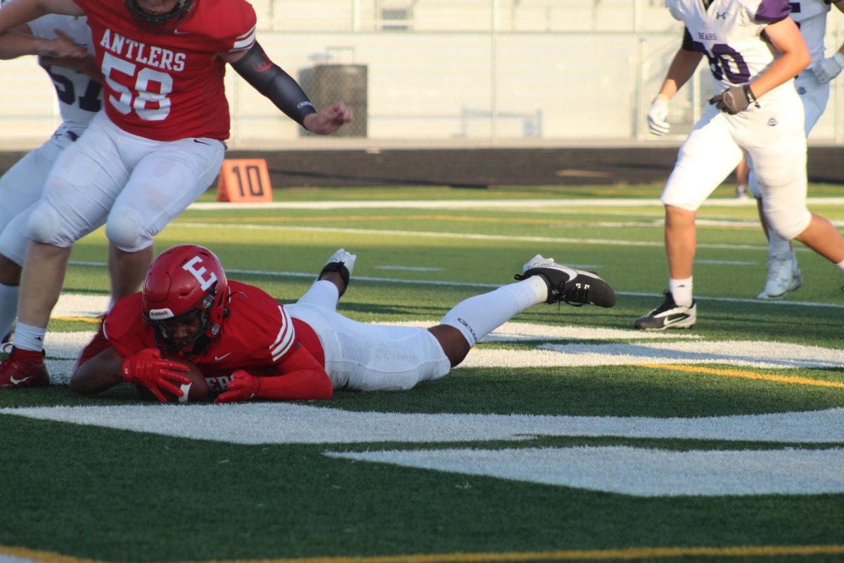 Trey Pacas tackles the ball.  The JV football team beat Blair with a final score of 21 - 0.