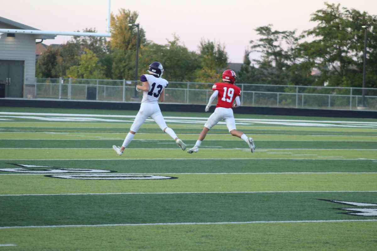 Josh Ludacka blocks an opponent from Blair. The JV football team beat Blair with a final score of 21 - 0.