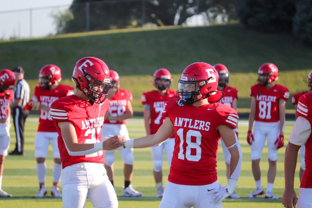 Juniors Elijah Beister and Jack Metschke congrat eachother after a great play.  This took place on September 3rd during the JV Antlers vs. Blair game. 