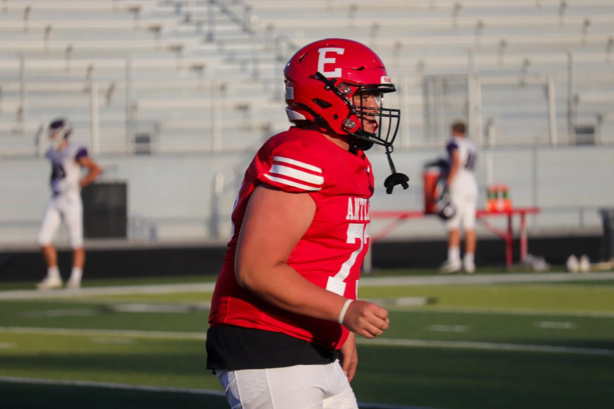 Junior Ethan Smith on defense runs back on the field. This took place on September 3rd during the JV Antlers vs. Blair game. 