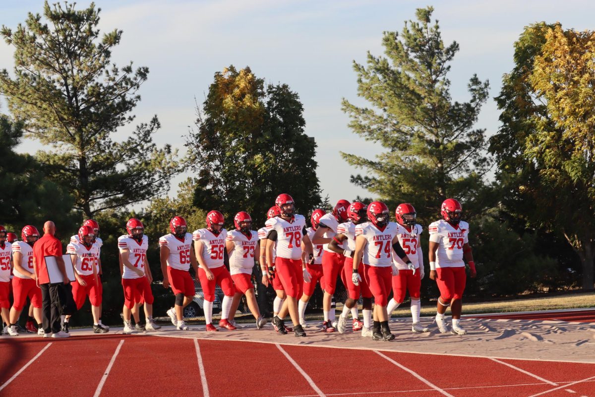 The football team walking onto the field for for the game. The final score was 0-28 Waverly on Friday September 20th.