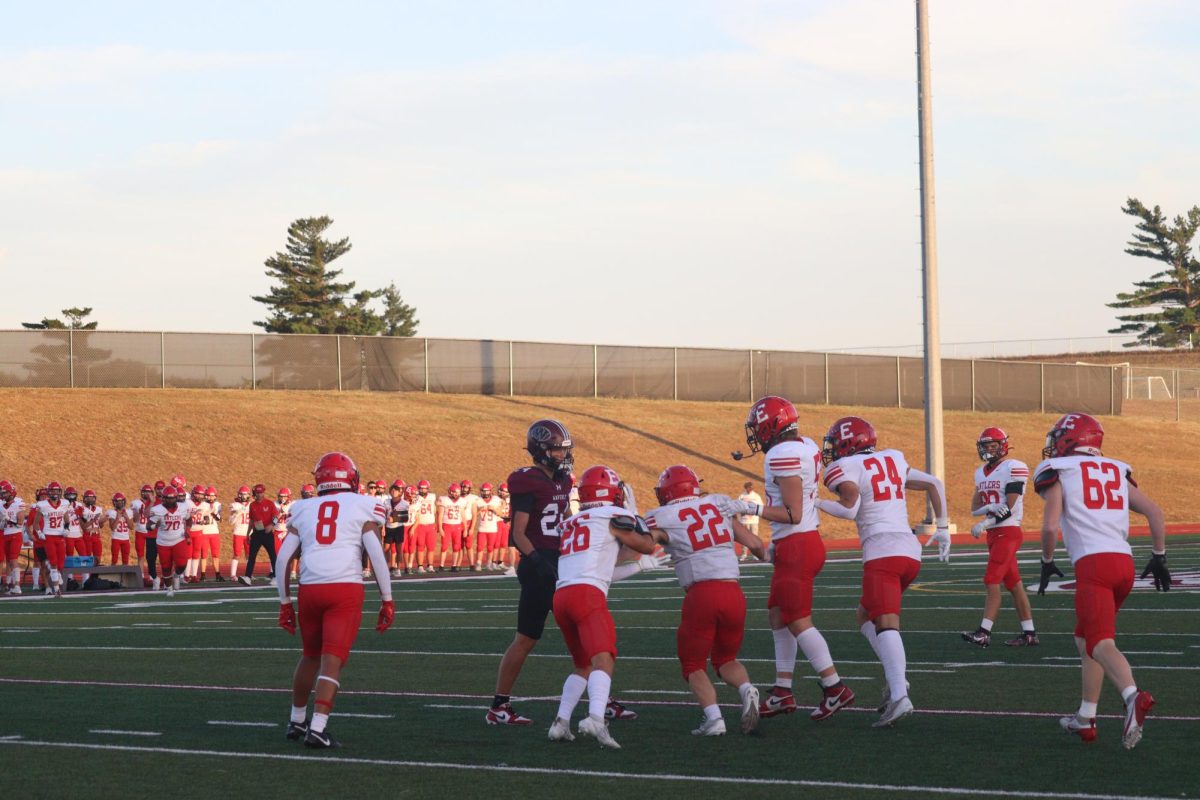 The team patting Sophomore Wyatt Worlie on the back as he got into the game. The final score was 0-28 Waverly on Friday September 20th.