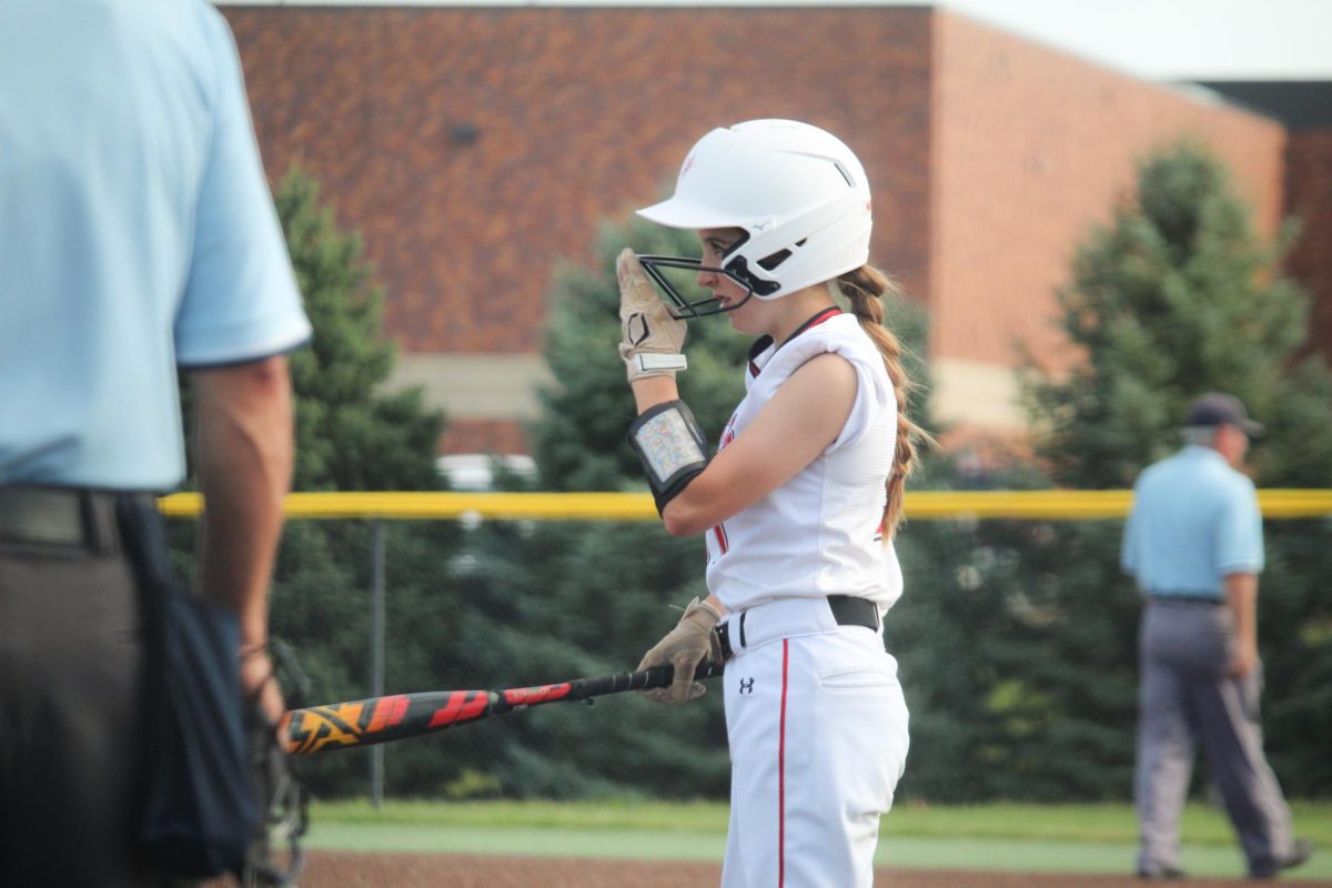 Freshman Sophia Nerz prepares to bat. This took place during the JV game vs Gretna.