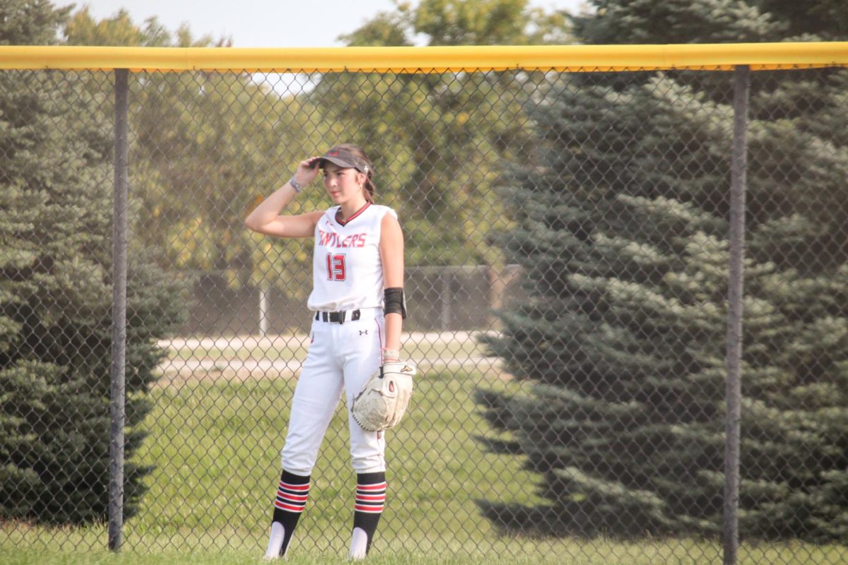 Junior Megan Erdkamp watches the infield closely. This took place during the JV game vs Gretna.