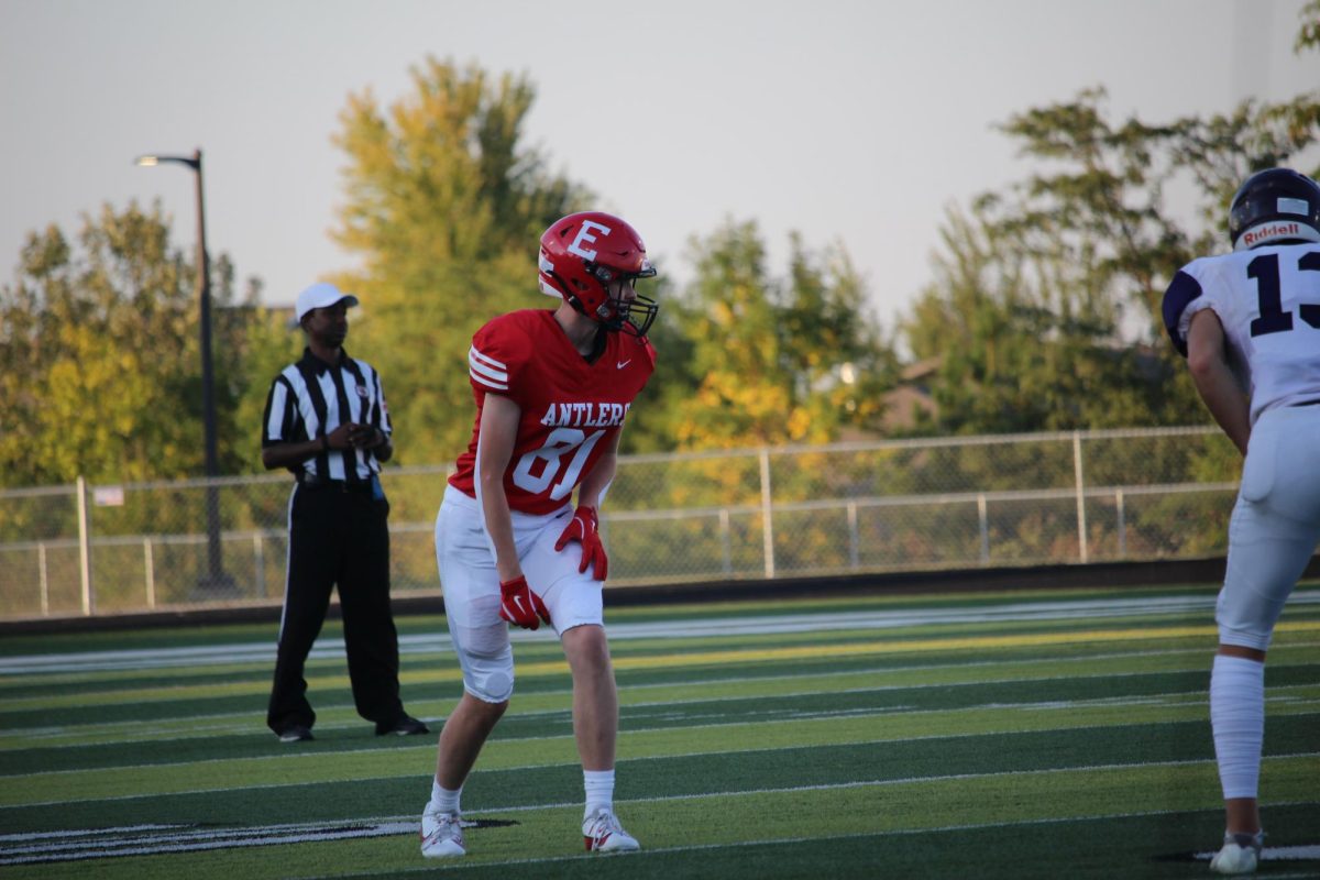 Sophomore Keyan Kosak waits for the ball to be snapped. JV football beat Blair 21-0 on 9/3 2024.