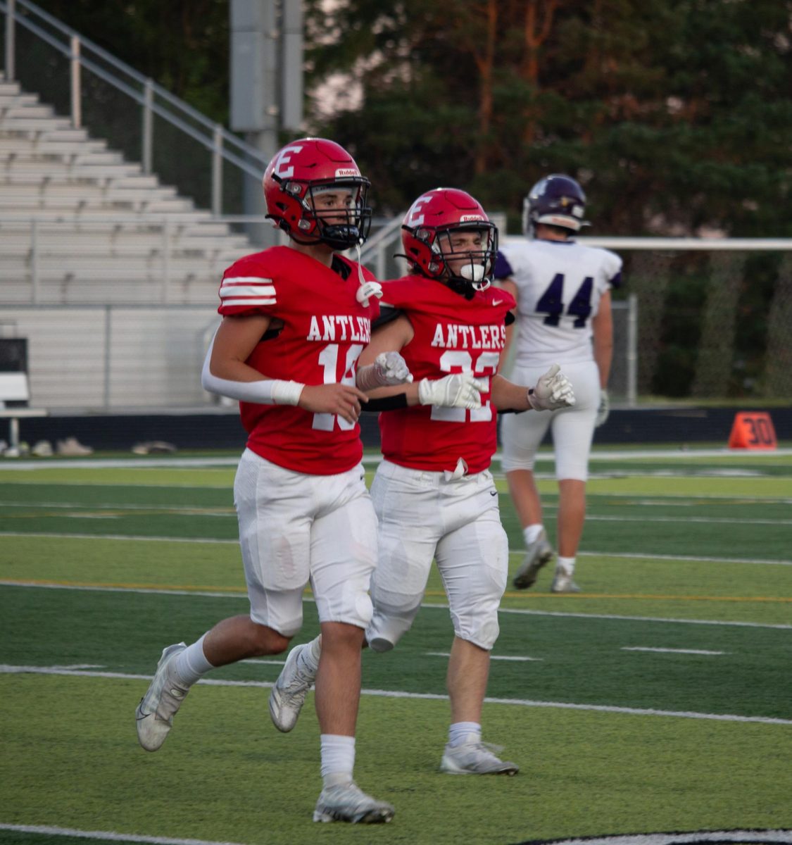 Josh Ludacka and Wyatt Worlie run back to the sideline. JV football beat Blair 21-0 on 9/3 2024.