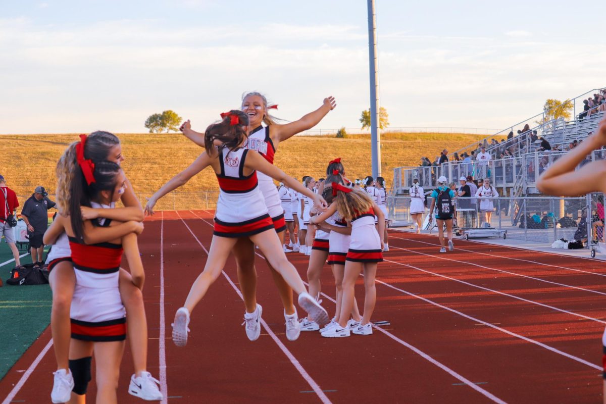 Sophomores Peyton Bartlett and Brooklyn Ballan get pumped before the game. The final score for varsity football on 9/20 was 0-28 Waverly.