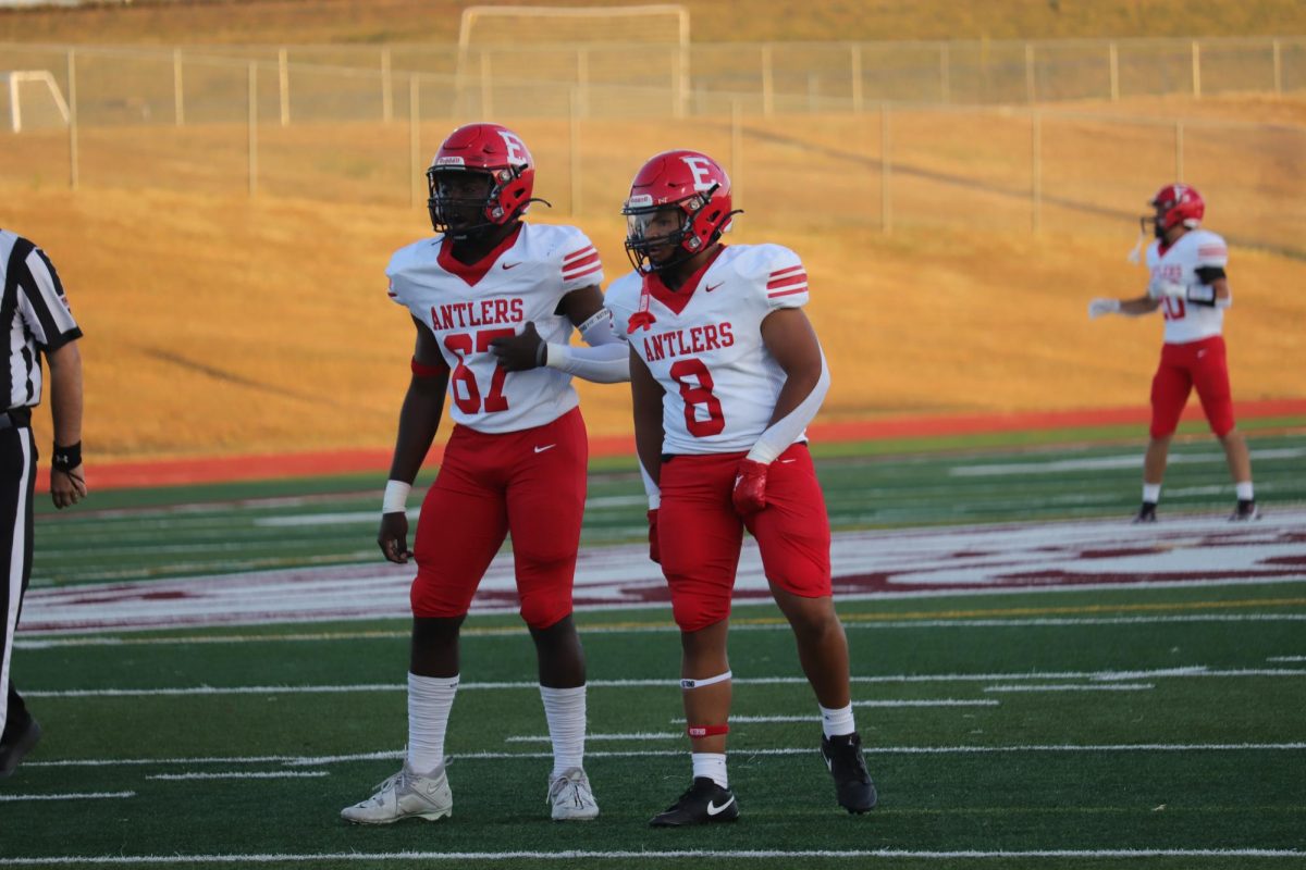 Fon Mofor and Koby Johnson are discussing the next play. The final score for varsity football on 9/20 was 0-28 Waverly.