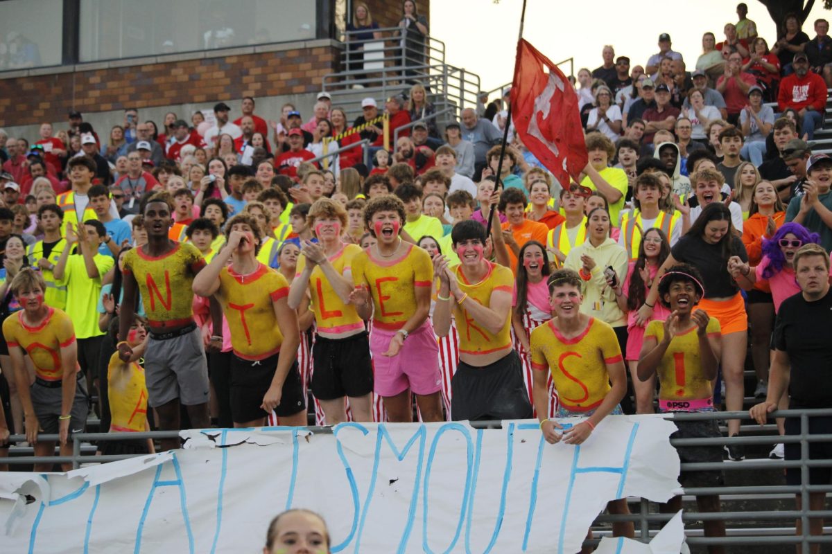 The Antler student section cheers on the football team. Elkhorn beat Plattsmouth.