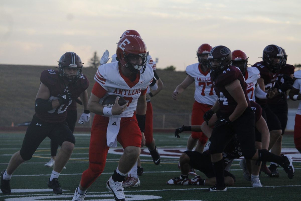 Kayd Mathews has the ball in his possession as he runs down the field. The varsity football game was on September 20th with a ending score of 0-28 Waverly. 