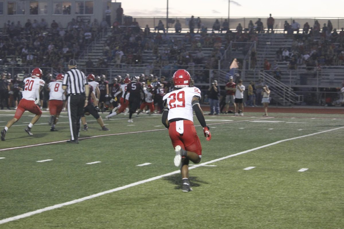 Jayden Moody is running down the field during the play. The varsity football game was on September 20th with a ending score of 0-28 Waverly. 