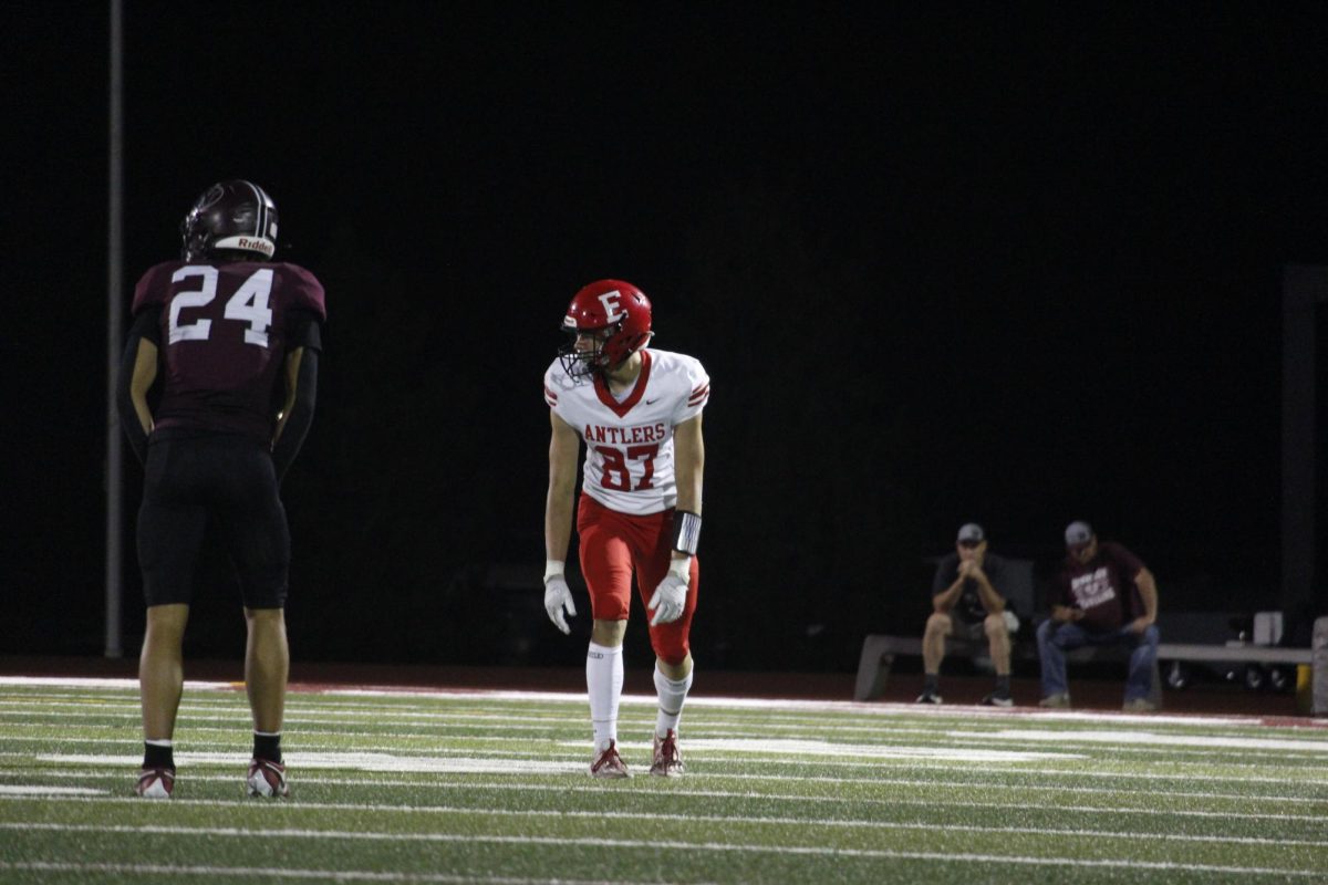 Senior Charlie Lamski is in position ready for the play. The varsity football game was on September 20th with a ending score of 0-28 Waverly. 