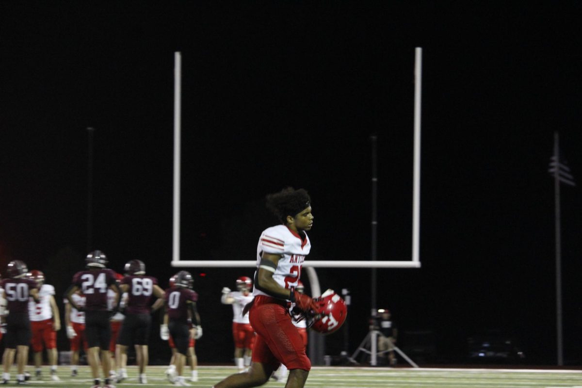 Jayden Moody is in disappointment while walking to the sidelines. The varsity football game was on September 20th with a ending score of 0-28 Waverly. 