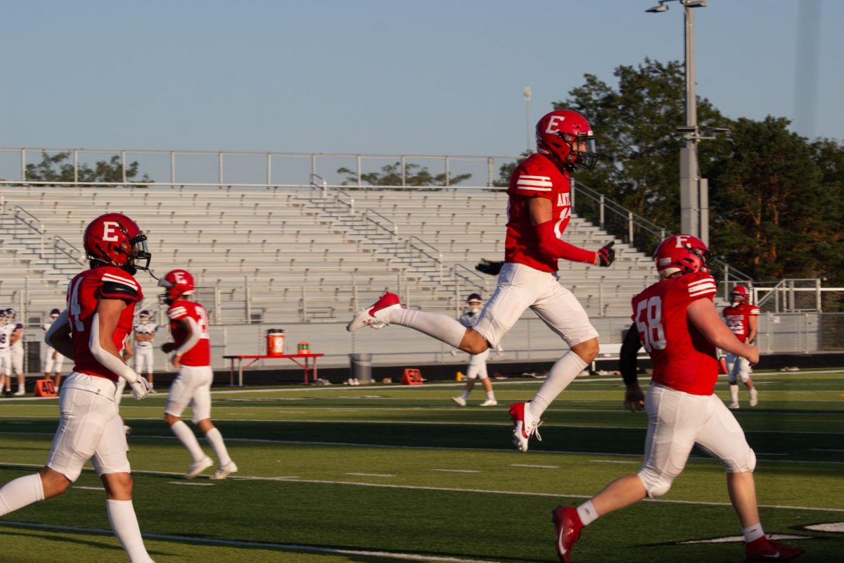 Matthew Ott celebrates a touchdown. JV football beat Blair 21-0 on 9/3.