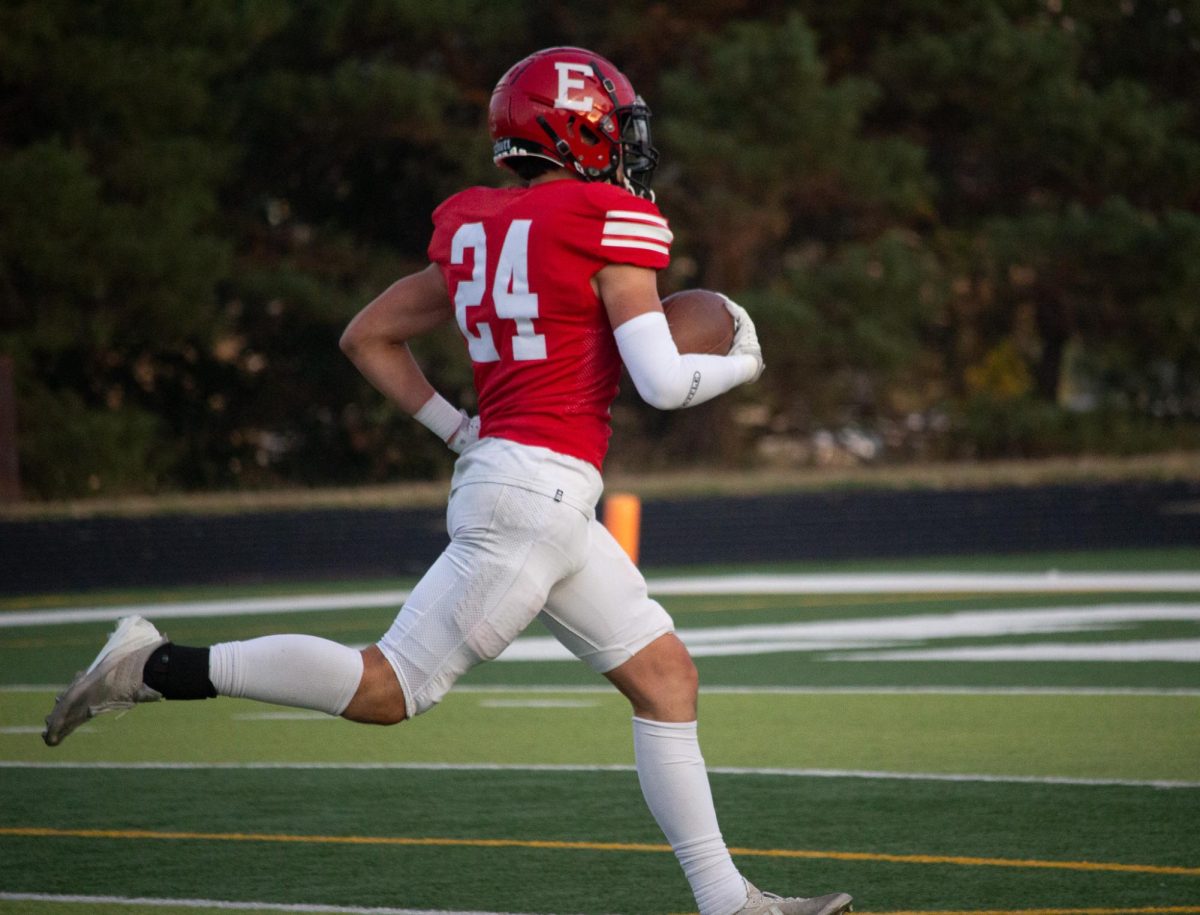 Junior, Reid Stec rushing to get a touchdown.