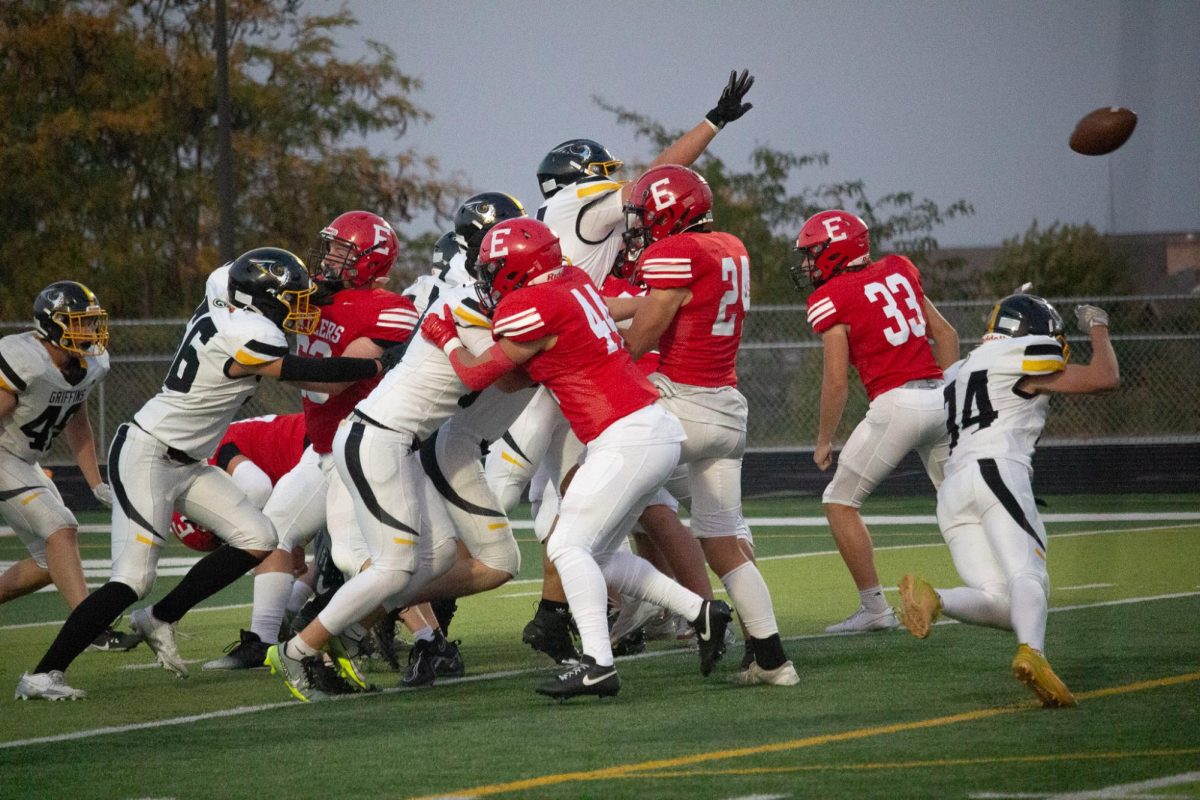 Elkhorn Antlers pushing against Gretna East.