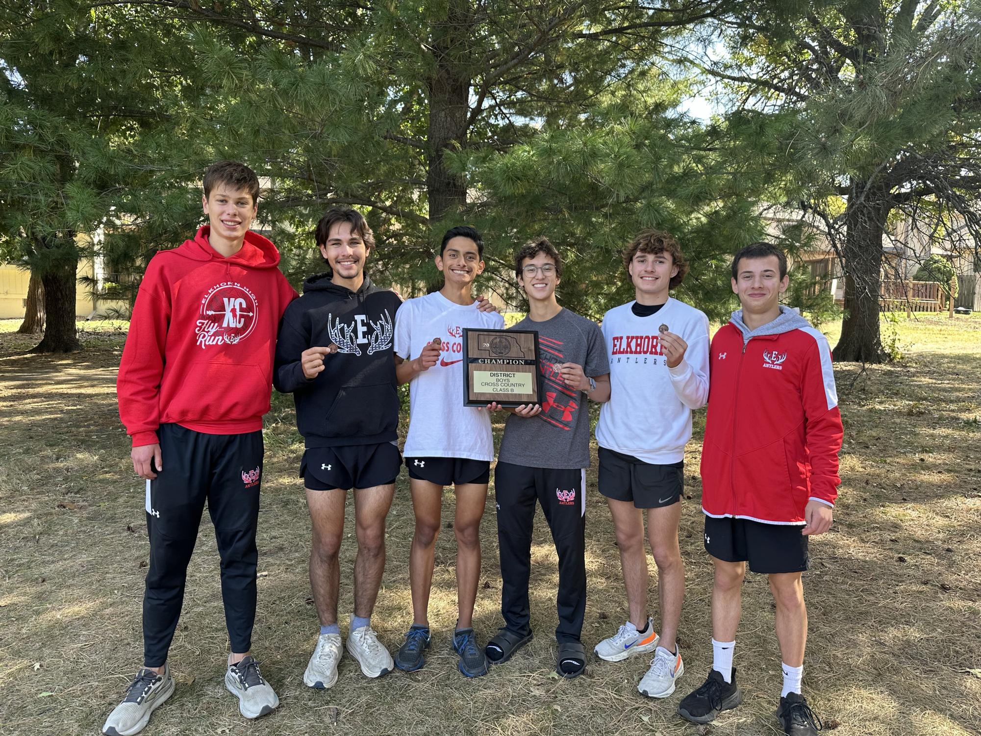 Members of the cross country team celebrate the team's district championship. From left: Elias Eyler, Garrett Barreras, Gerardo Hernandez-Tapia, Finn Hartman, Brayden Romero, Kellen Krivohlavek.
Photo courtesy of Spencer Stednitz.