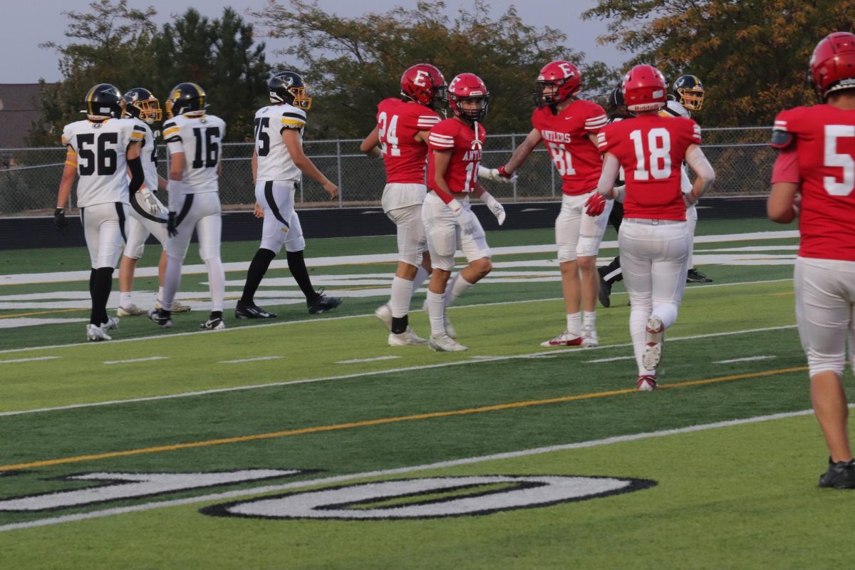 Junior, Reid Stec and sophomore, Keyan Kosak celebrating after a touch down. 