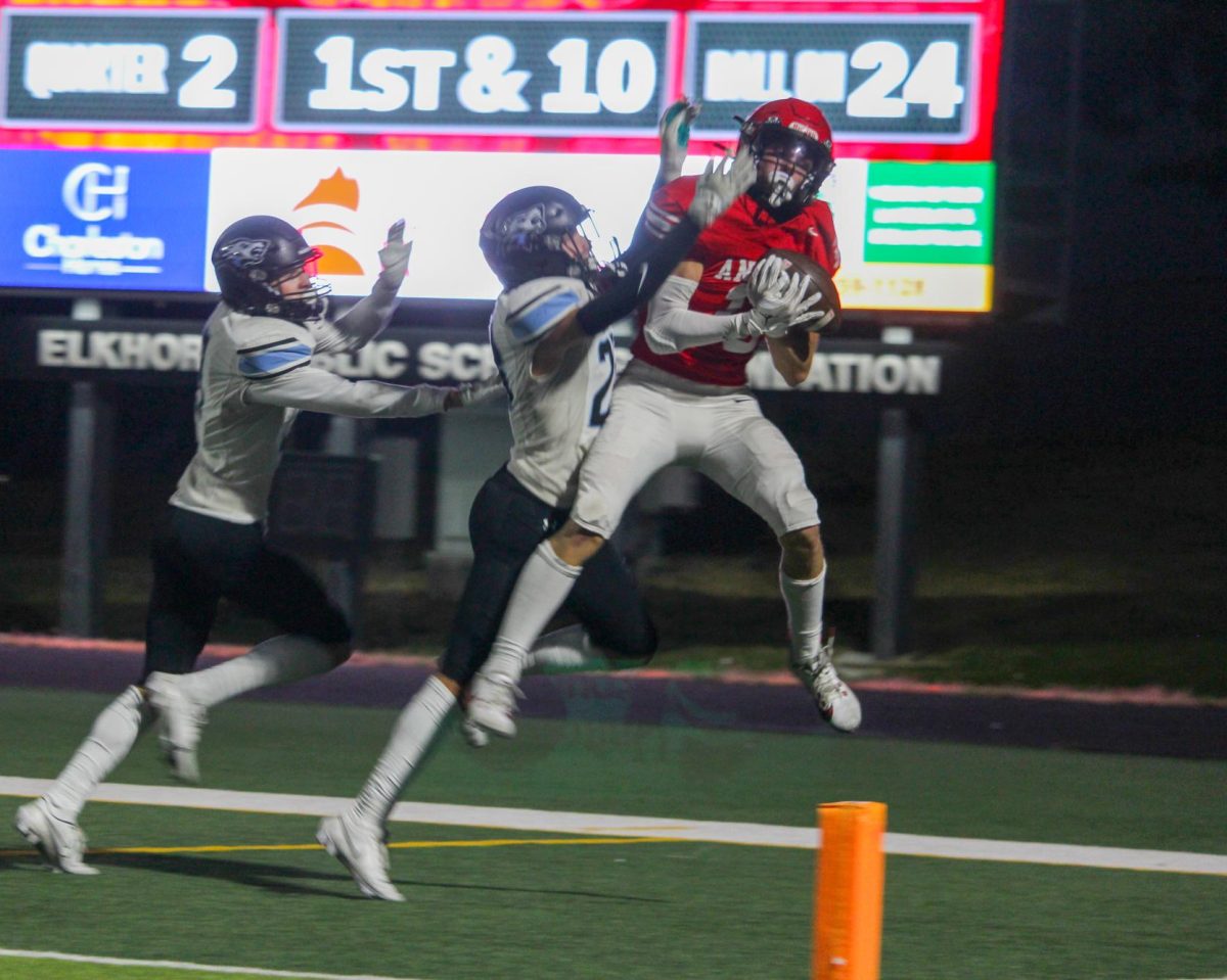 Sophomore Matt Ott catches a pass and scores for the Antlers. The JV football team lost to Elkhorn North, 33-13. 