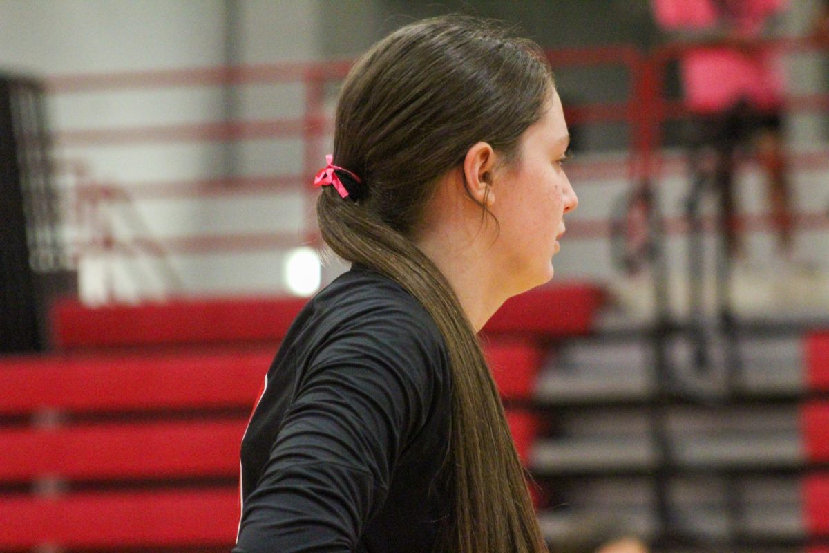 Sophomore Callie Petersen awaits the next play. This game took place on 10/3, and the Antlers lost to Bellevue East 2-1.