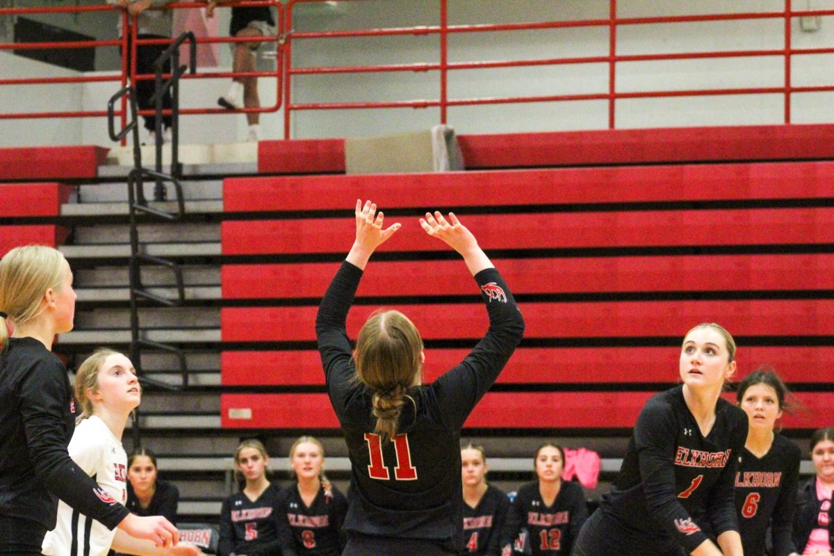 Senior setter Macie Burson puts her hands up to set the ball. This game took place on 10/3, and the Antlers lost to Bellevue East 2-1.