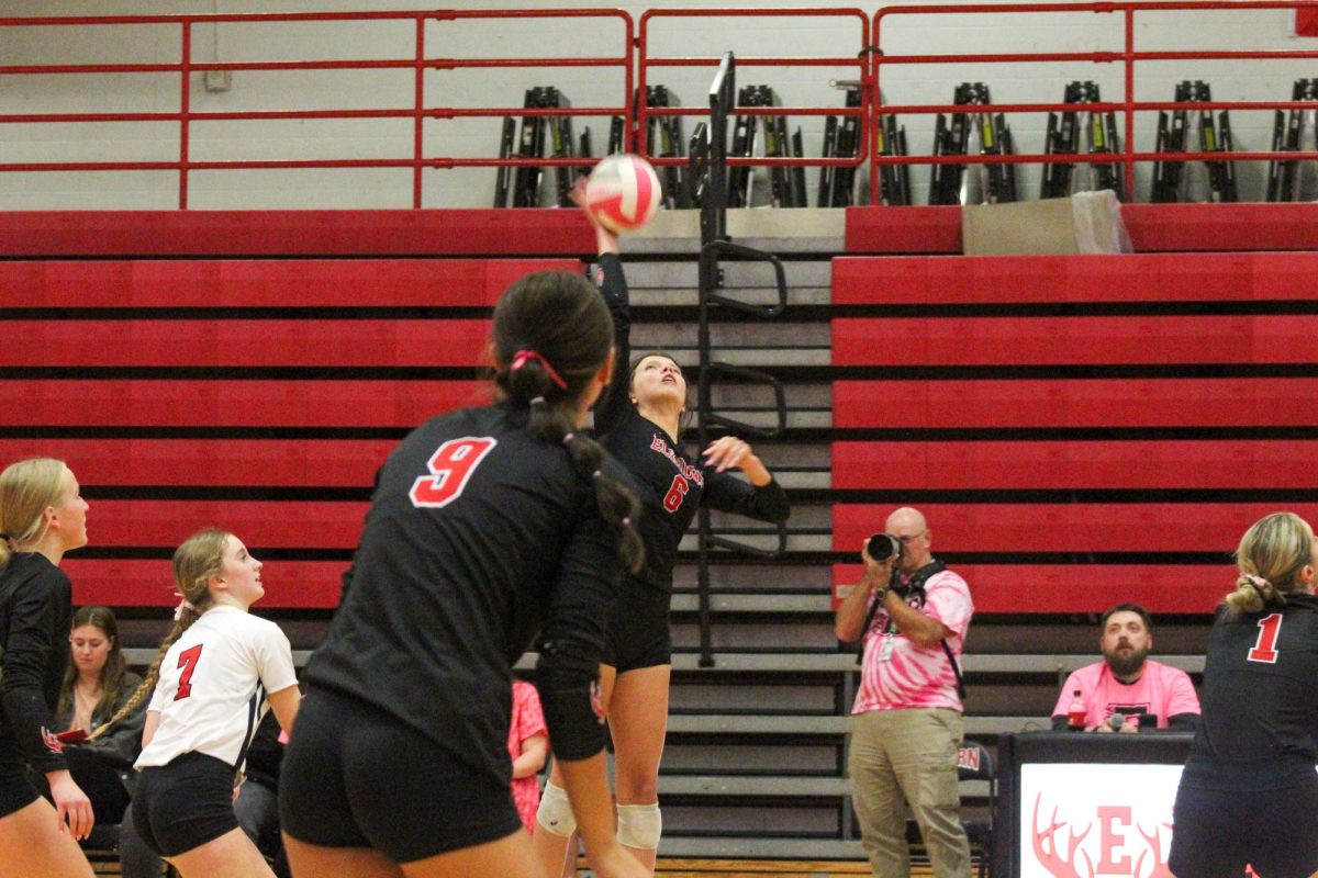 Sophomore Kaiya Gilbert hits the ball over the net. This game took place on 10/3, and the Antlers lost to Bellevue East 2-1.