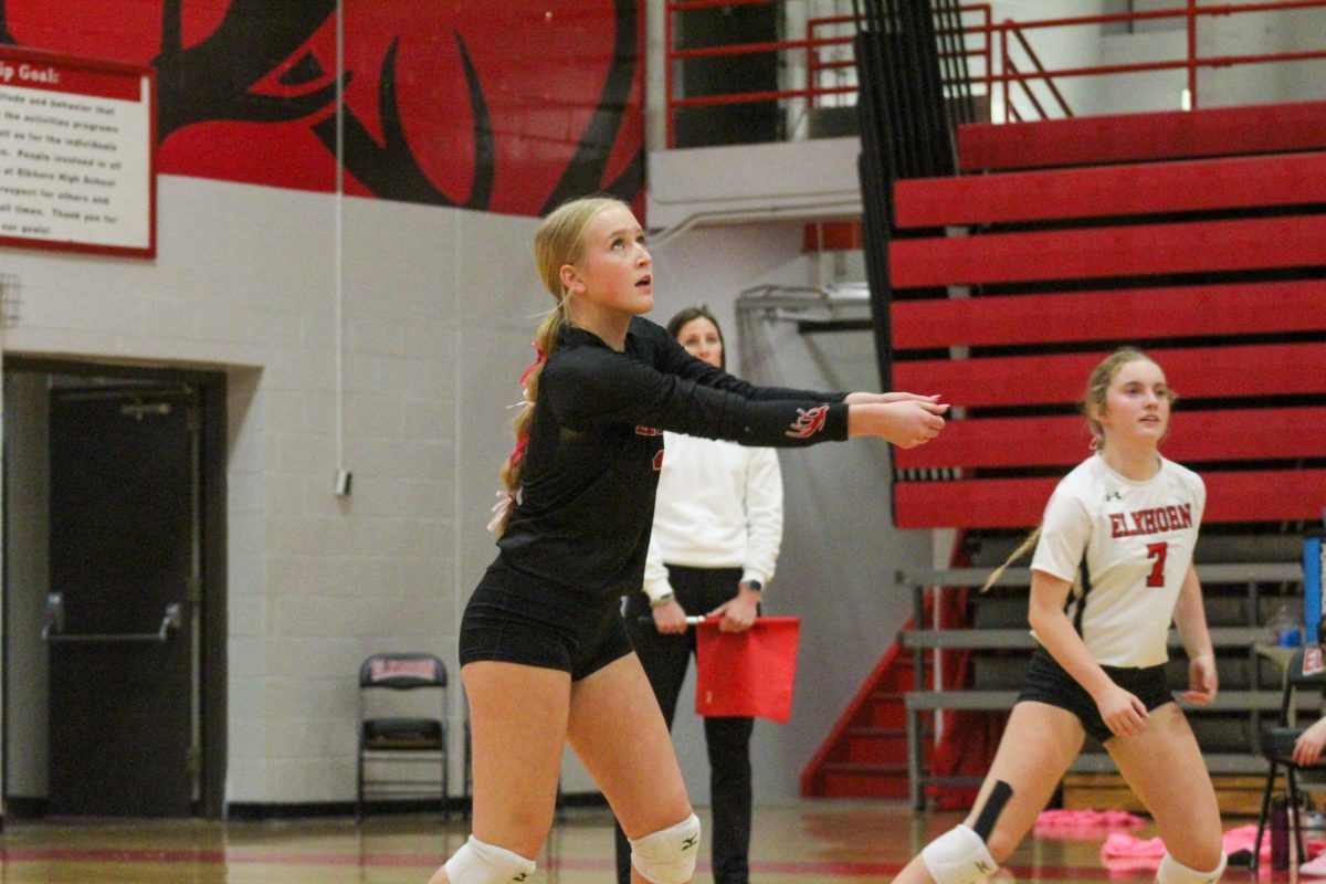 Senior Kenzie Doiel makes a platform with her arms. This game took place on 10/3, and the Antlers lost to Bellevue East 2-1.