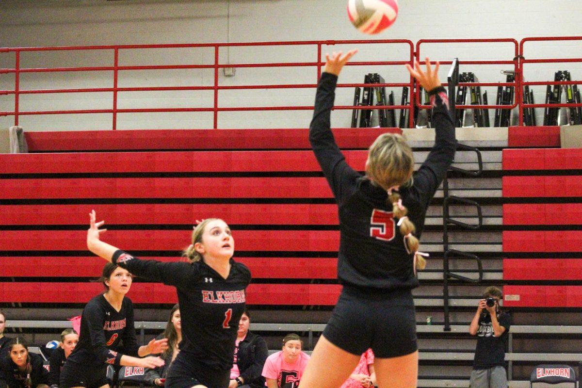 Senior setter Lauren Fast sets the ball to senior Addie Hunt. This game took place on 10/3, and the Antlers lost to Bellevue East 2-1.