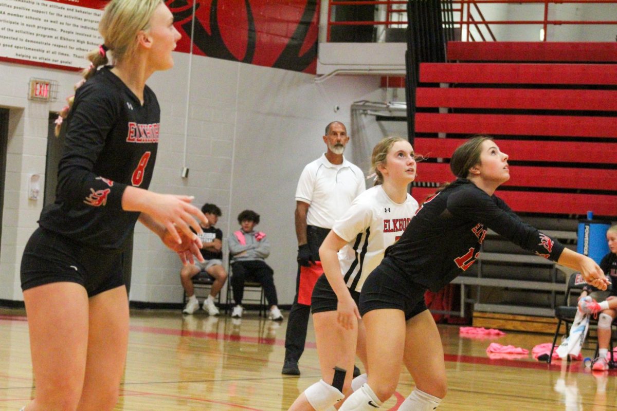 Sophomore Parker Steskal looks up at the incoming ball. This game took place on 10/3, and the Antlers lost to Bellevue East 2-1.