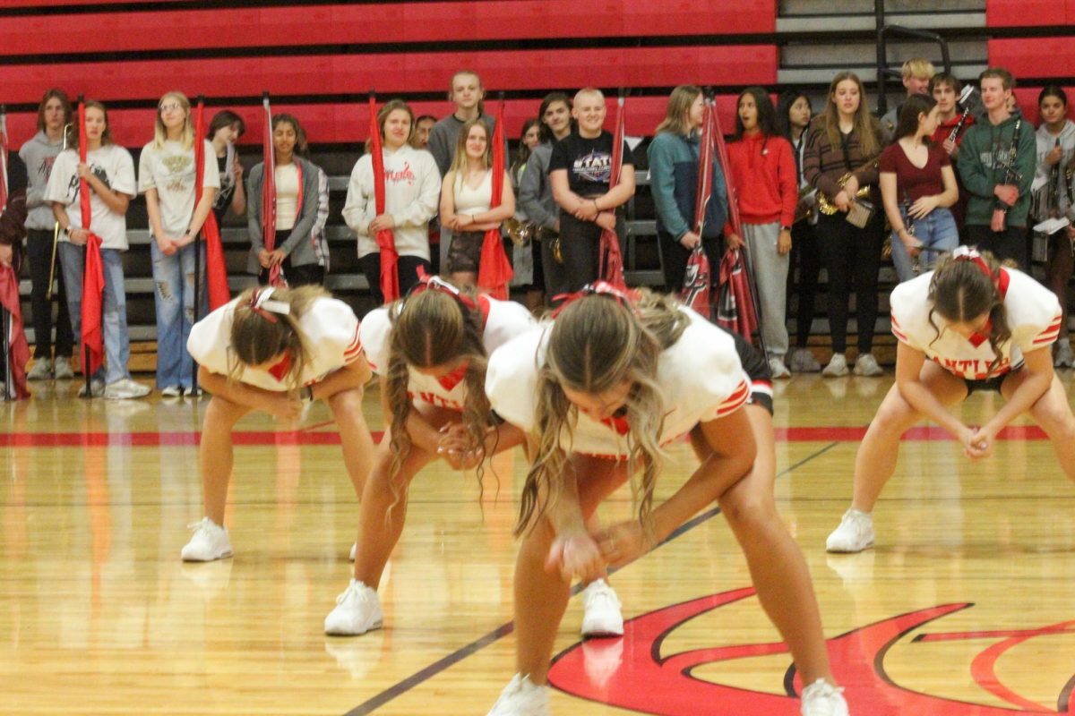 The Elkhorn Dance team is in sync during their routine. This took place during the Homecoming pep rally on Friday the 4th.