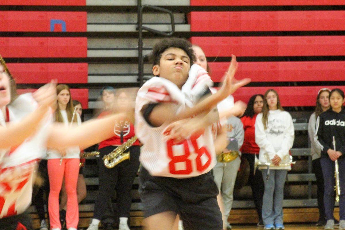 Freshman dancer Bennett Wallace shows his emotion during the dance. This took place during the Homecoming pep rally on Friday the 4th.