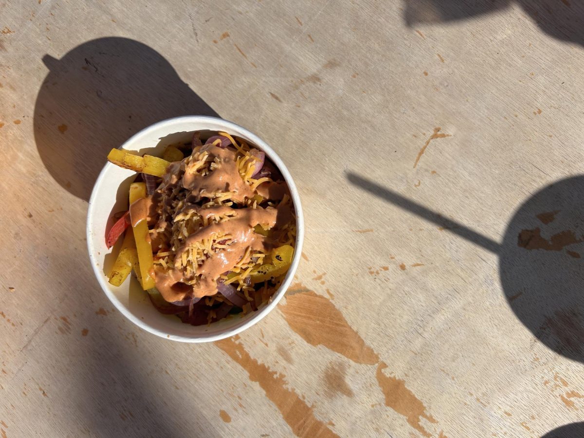 This a nosh bowl from Heartland Coffee and Nosh filled with steak, vegetables, and rice. This was taken September 27th at Junkstock in Waterloo. 