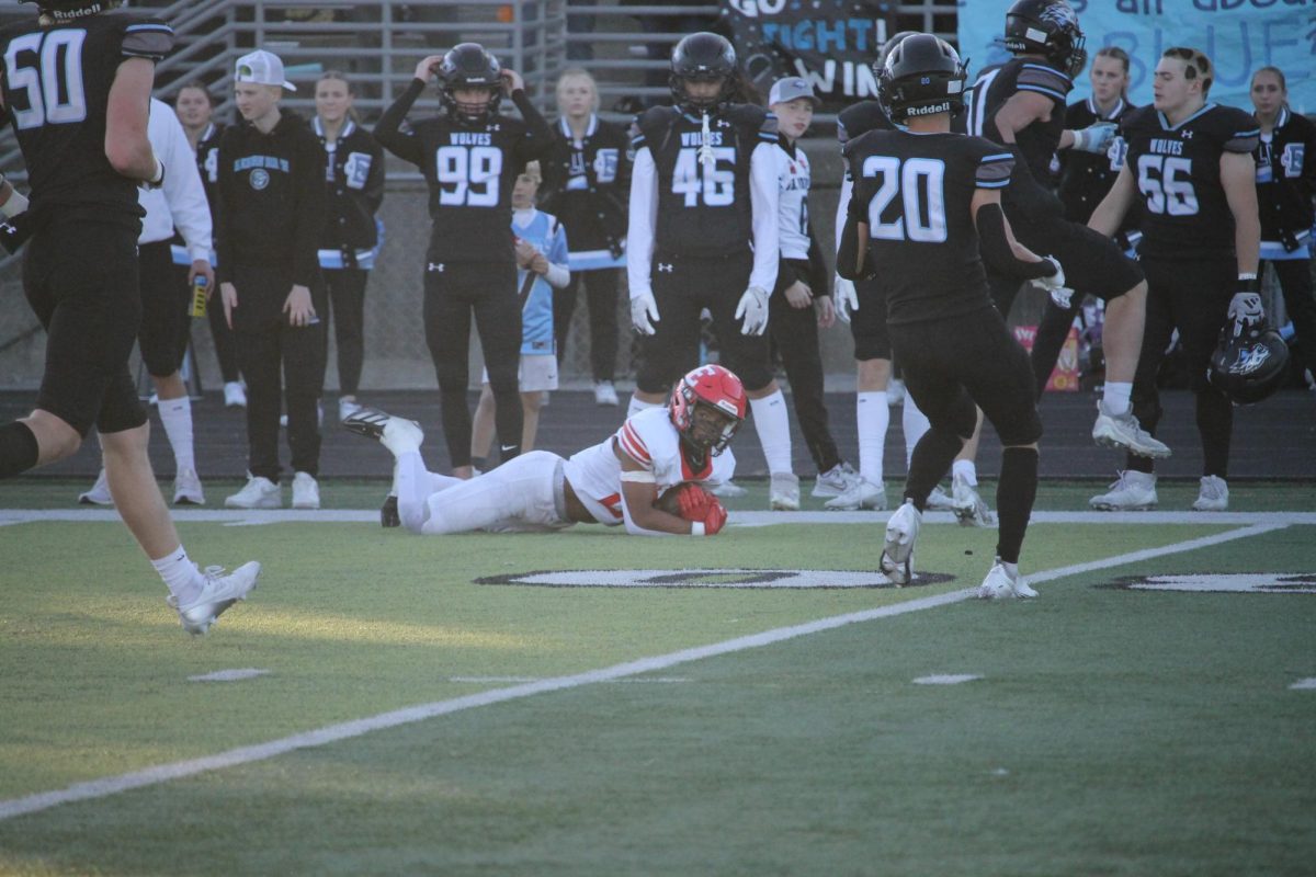 Senior Jayden Moody catches the ball senior Kayd Matthews threw.