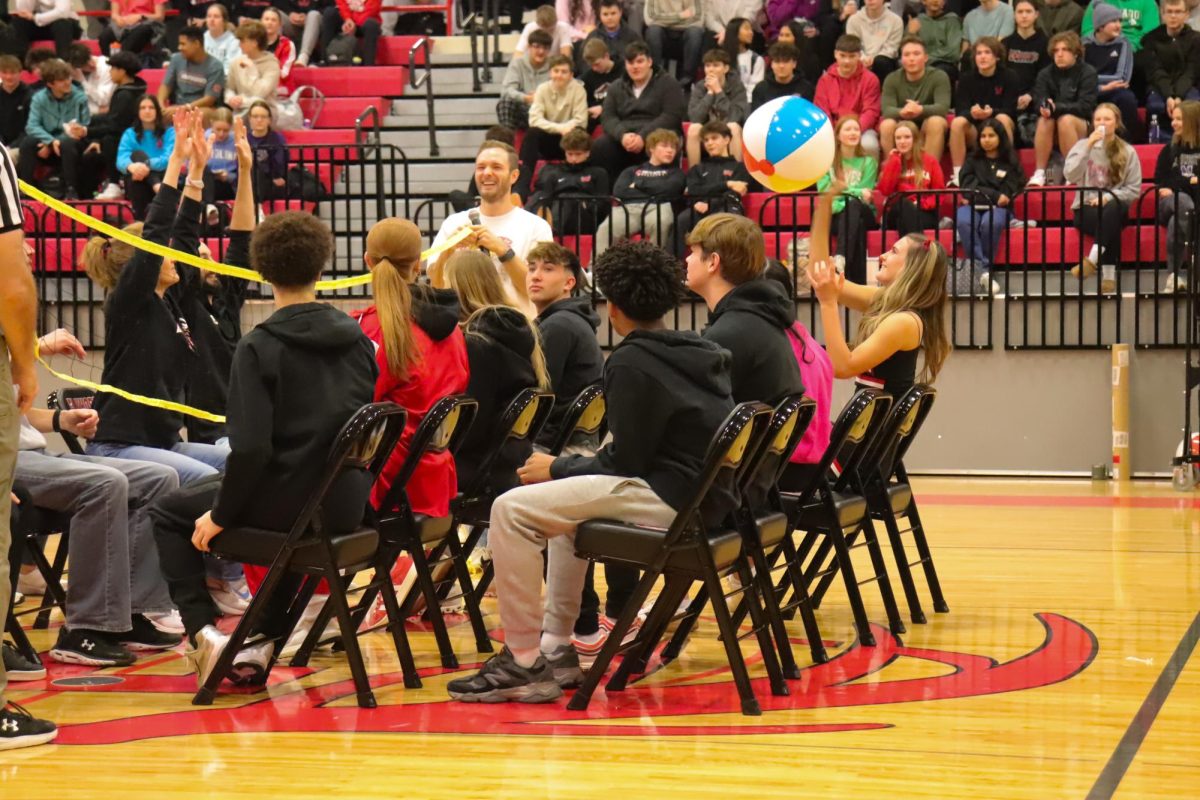 The Elkhorn High staff verses the students in seated volleyball during the pep rally on January 17, 2025.