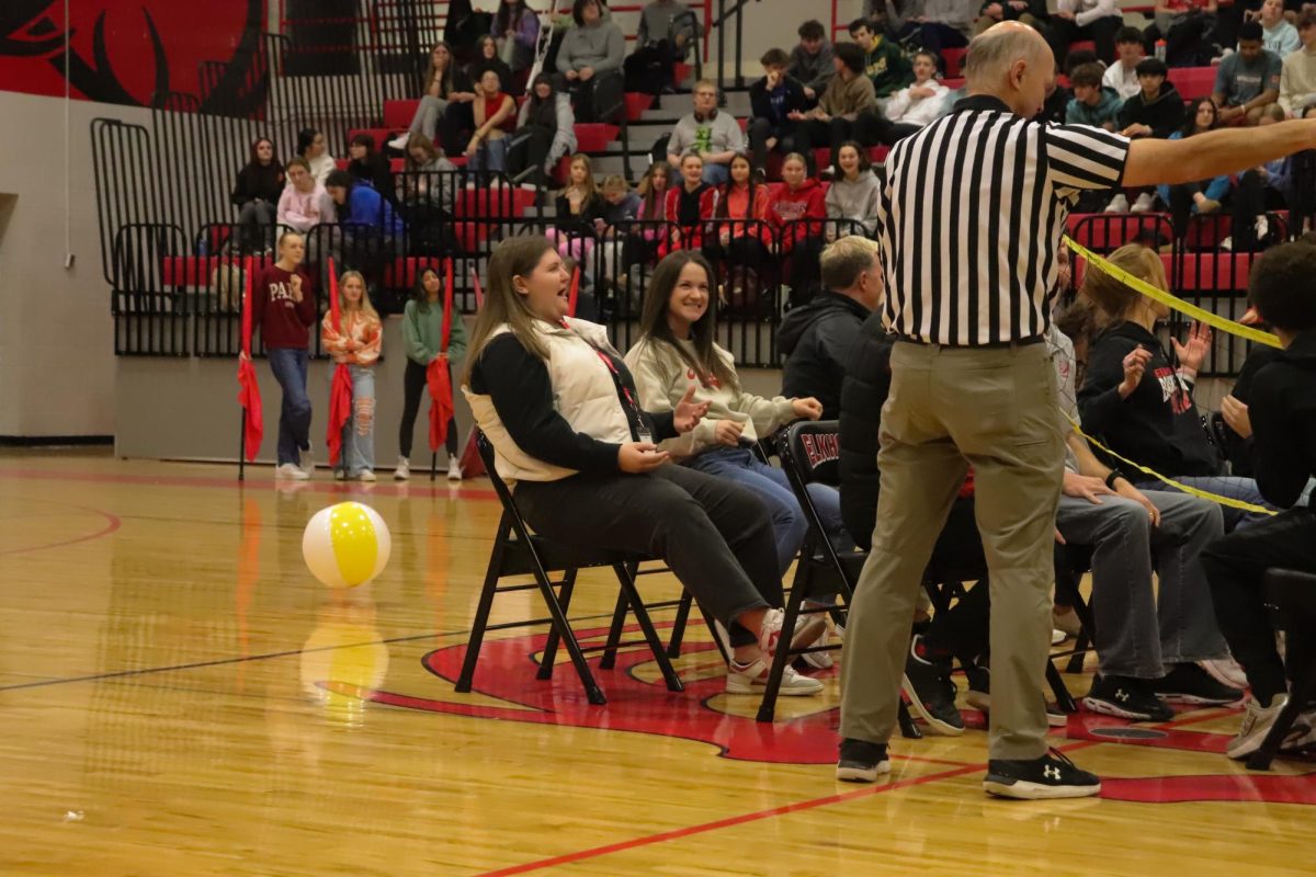 Bacus gives the point to the students when playing seated volleyball on January 17, 2025.