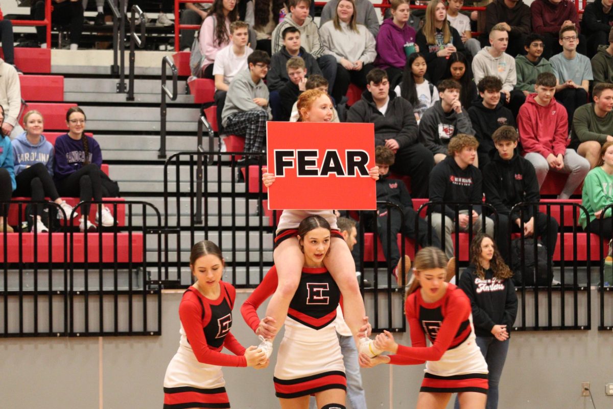 The cheer team is cheering and stunting during the rally. The winter Pep rally was on January 17th, 2025. 