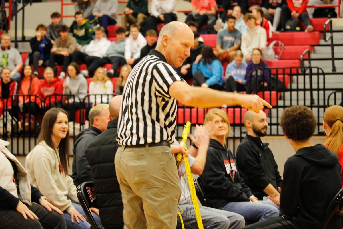 Ref Bacus taking charge during the seated volleyball game teachers vs students. This happened January 17th, 2025.