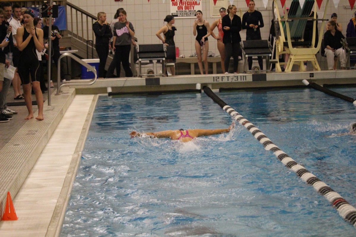 Elkhorn swimmer maintaining her strides.