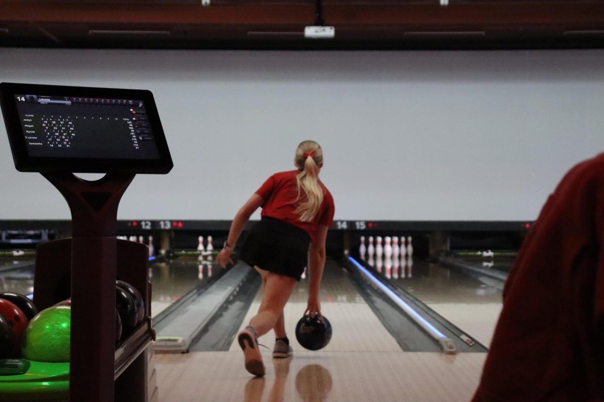 Junior Lorena Mishler concentrates on picking up a spare in a recent bowling match. The Antlers qualified for state behind Mishler's record-setting season.

Courtesy of Elkhorn bowling