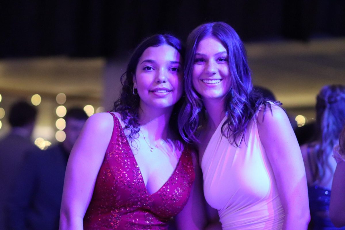 Senior girls pose for a picture while at the dance.