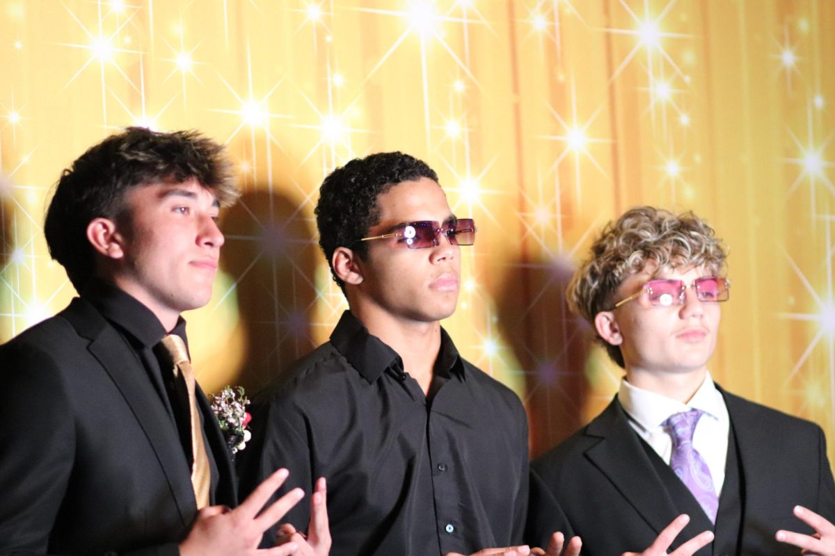 Senior boys pose for a picture.