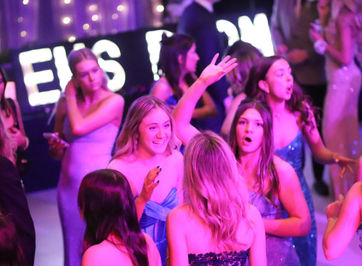 Junior and Senior girls dance at prom.